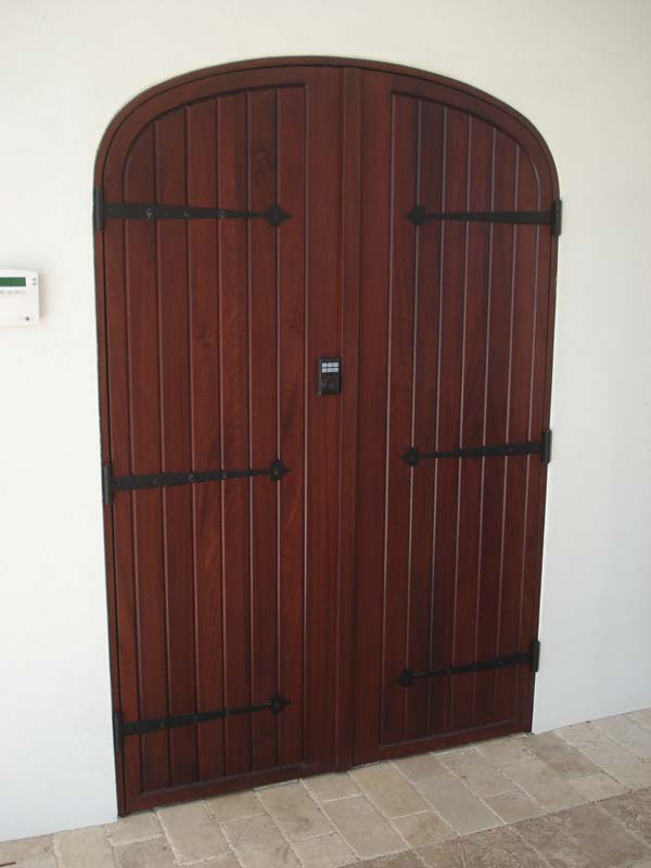 arched top custom door with strap hinges